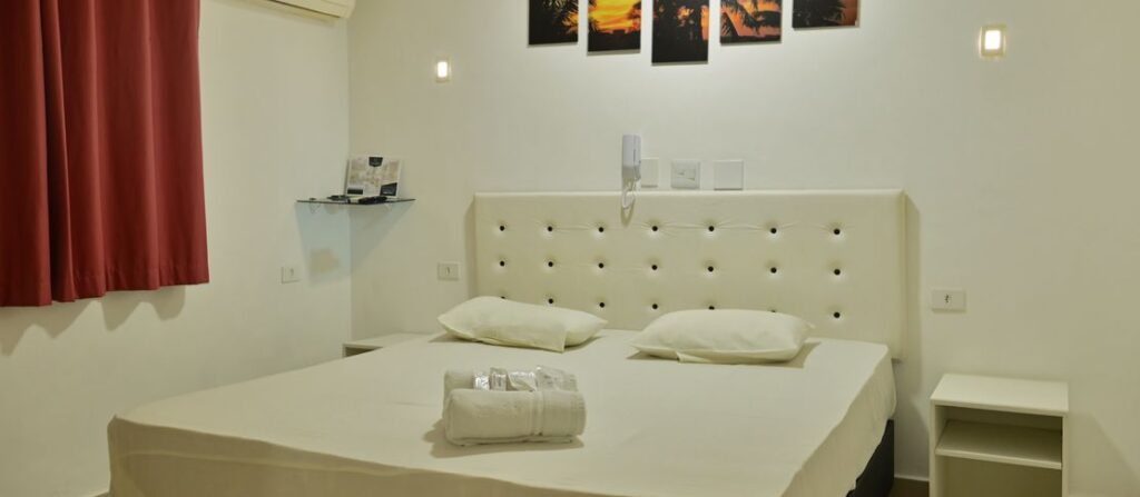 Suíte Single do Alba Hotel com cama de casal